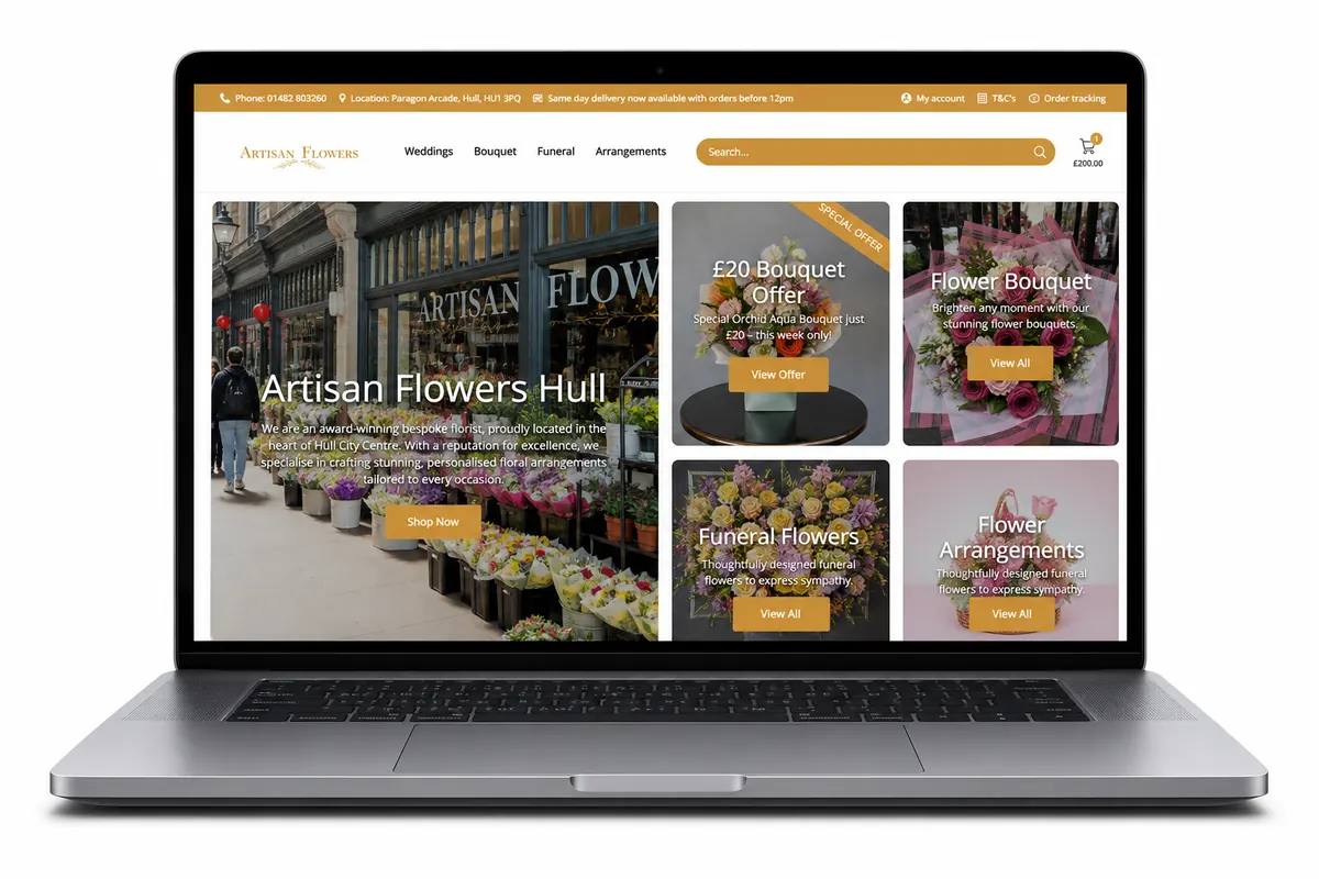 Laptop showing the Artisan Flowers website